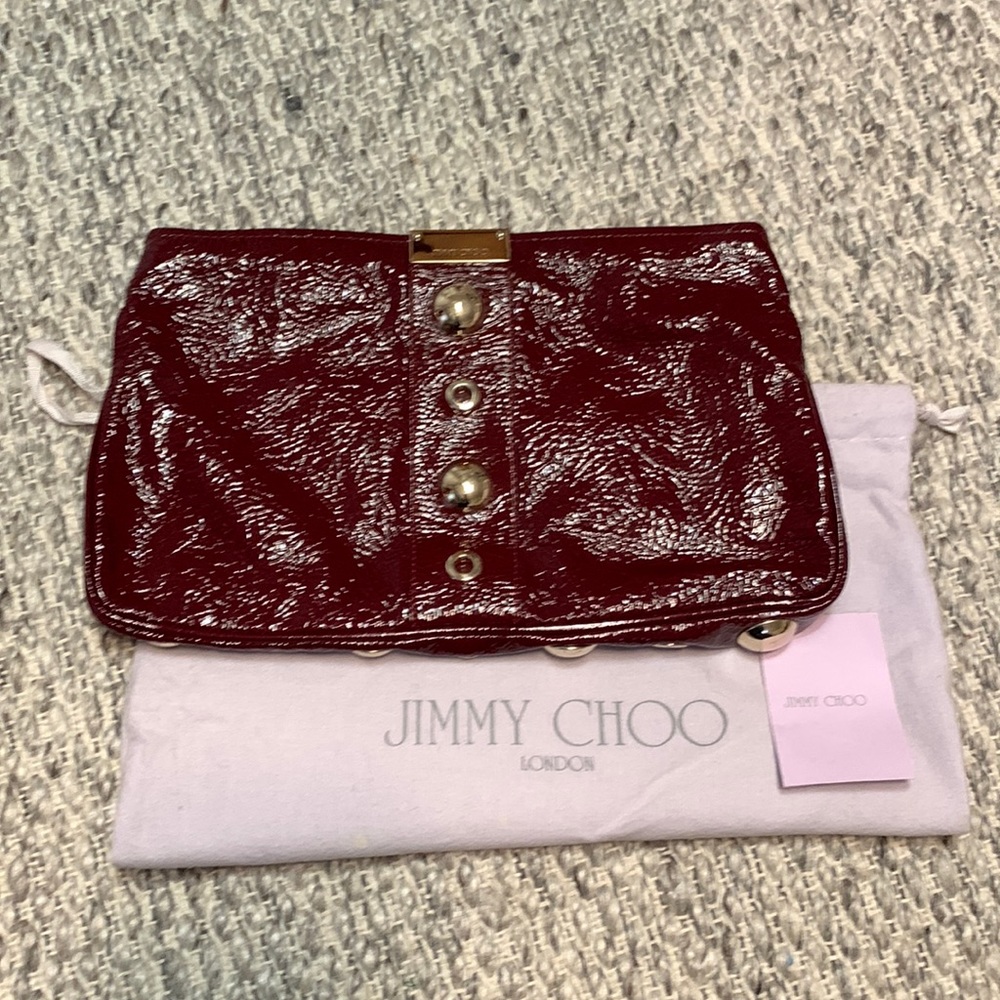 Jimmy Choo burgundy patent leather clutch